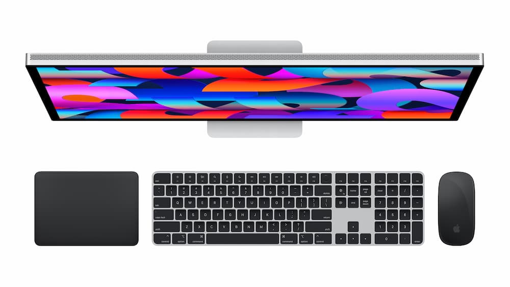 Apple Studio Display with Magic Trackpad Keyboard Mouse screen